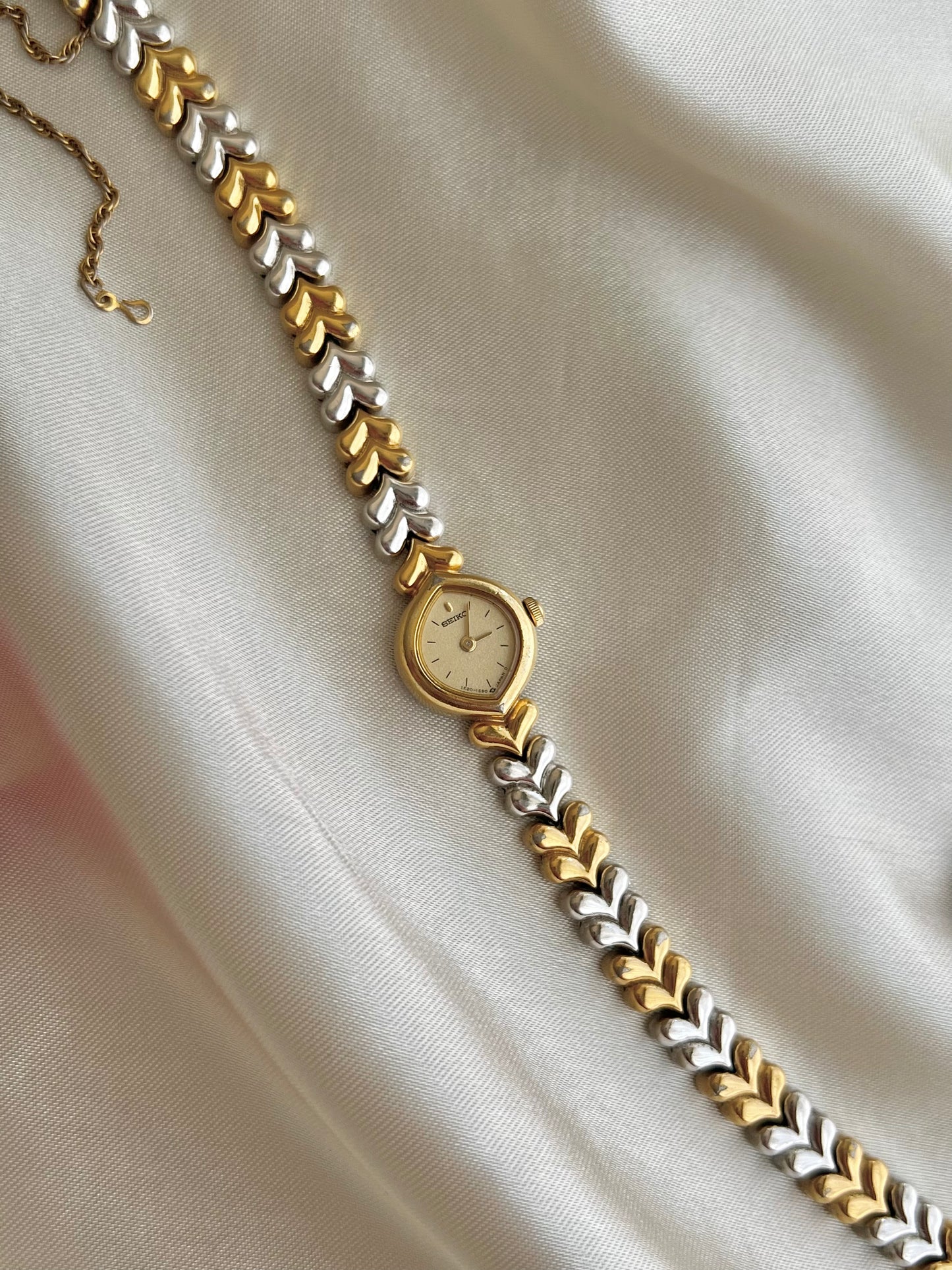 Seiko Champagne Dial Tear Drop Watch with Two-Tone Leaf-Link Bracelet