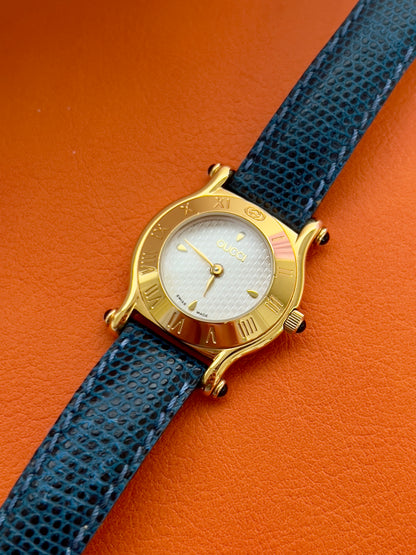 Gucci Gold Toned Ladies Watch with Roman Bezel and Textured Dial