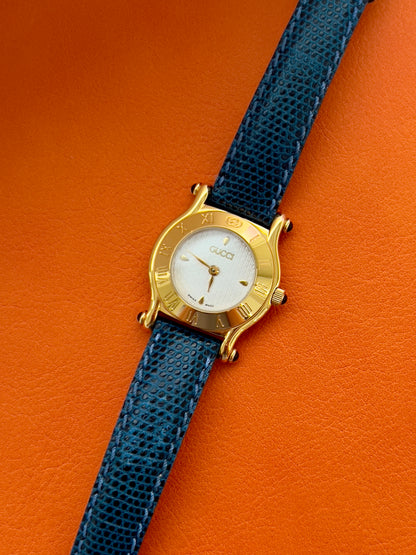 Gucci Gold Toned Ladies Watch with Roman Bezel and Textured Dial
