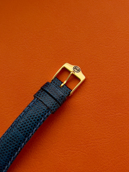 Gucci Gold Toned Ladies Watch with Roman Bezel and Textured Dial