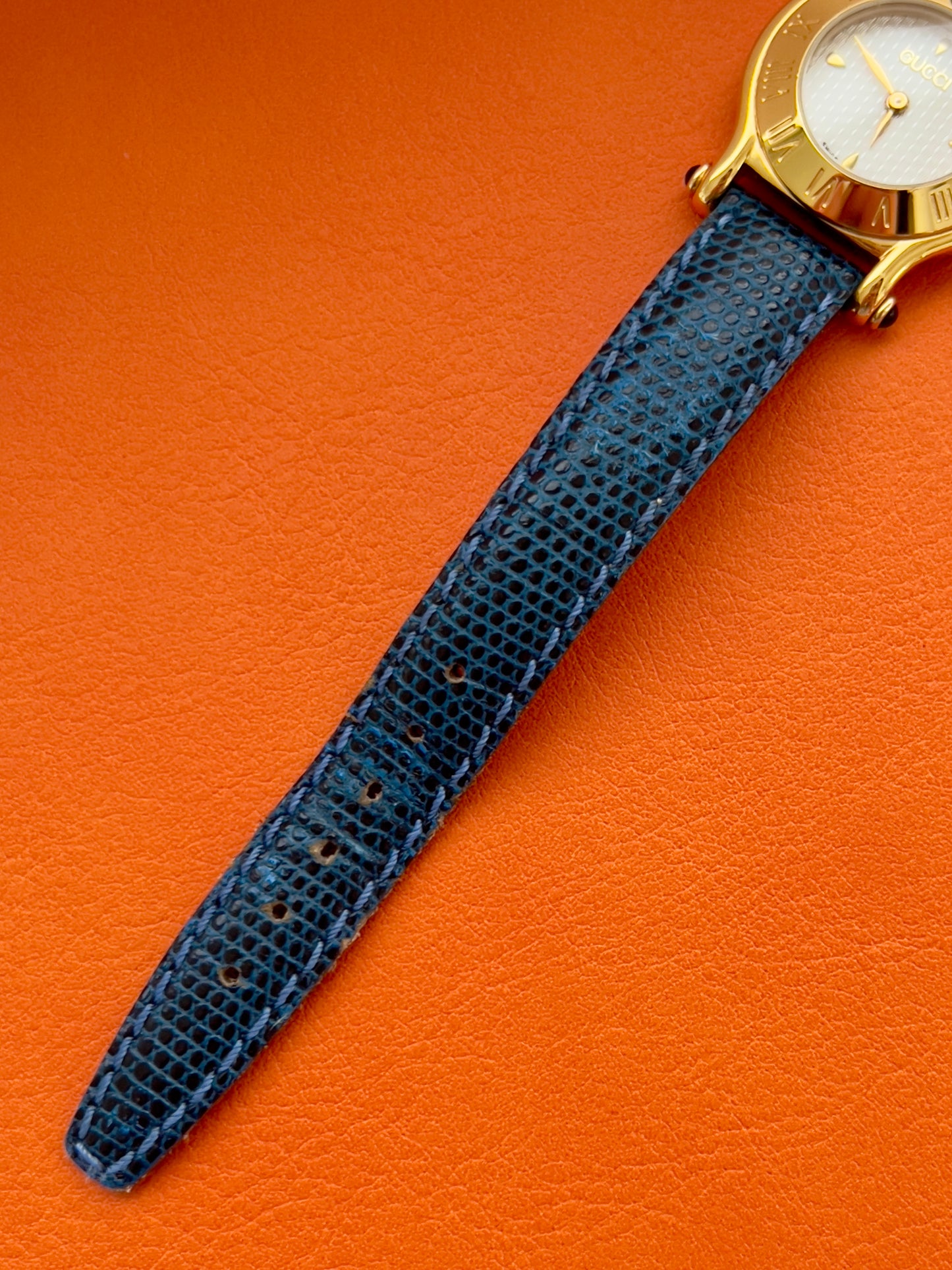 Gucci Gold Toned Ladies Watch with Roman Bezel and Textured Dial