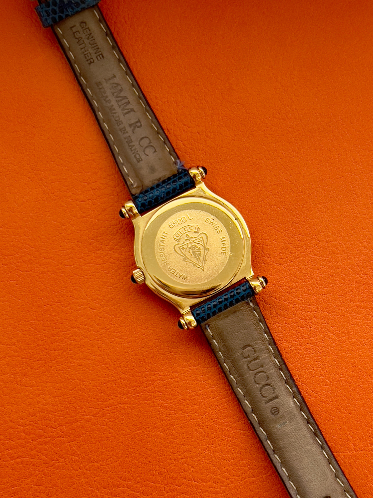 Gucci Gold Toned Ladies Watch with Roman Bezel and Textured Dial