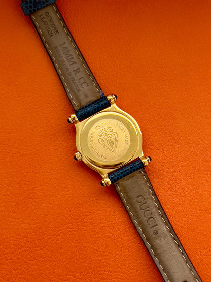 Gucci Gold Toned Ladies Watch with Roman Bezel and Textured Dial