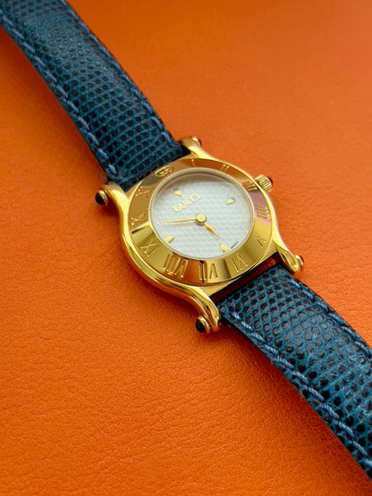 Gucci Gold Toned Ladies Watch with Roman Bezel and Textured Dial