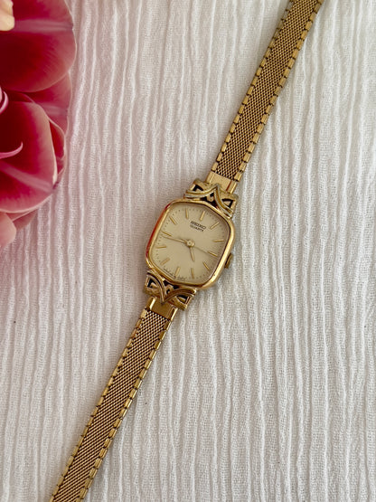 Seiko Ladies Gold Watch with Satin Champagne Dial and Mesh Bracelet