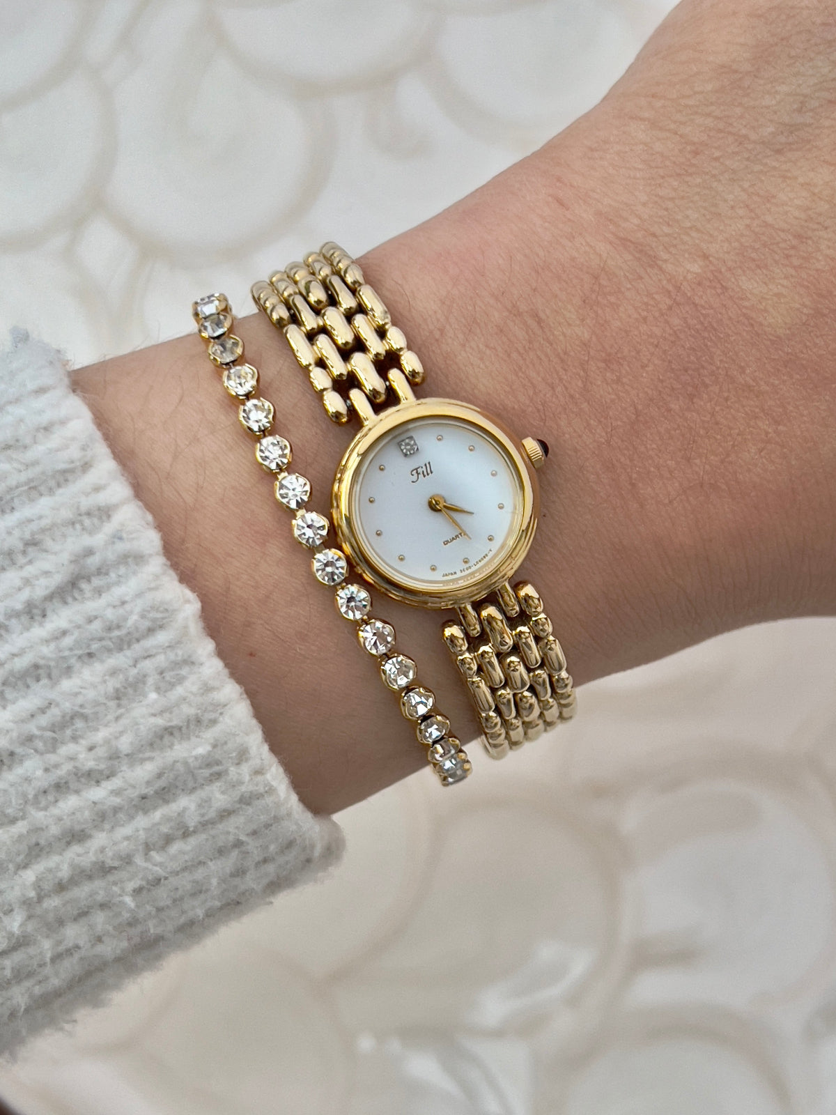 Vintage Citizen Fill ladies gold-tone bracelet watch with white dial and crystal accent
