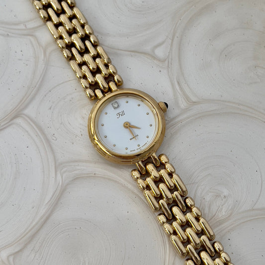 Vintage Citizen Fill ladies gold-tone bracelet watch with white dial and crystal accent