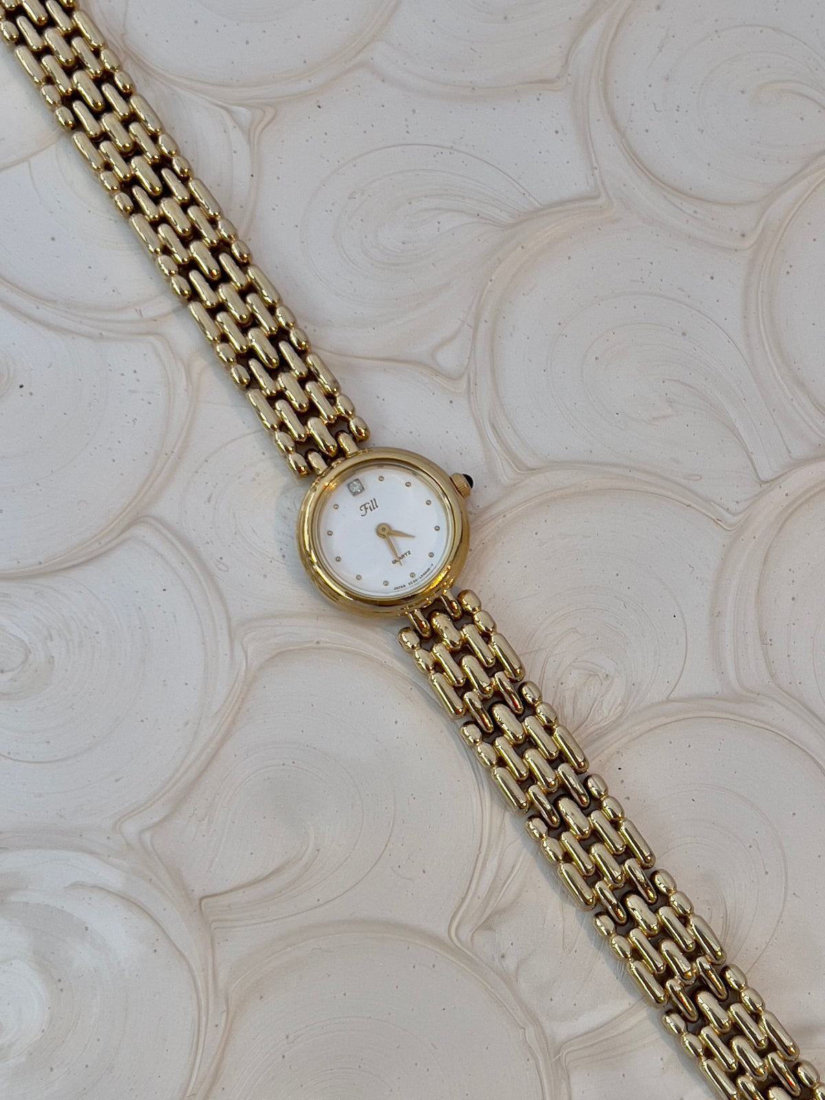 Vintage Citizen Fill ladies gold-tone bracelet watch with white dial and crystal accent