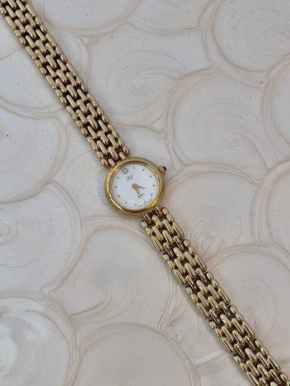 Vintage Citizen Fill ladies gold-tone bracelet watch with white dial and crystal accent