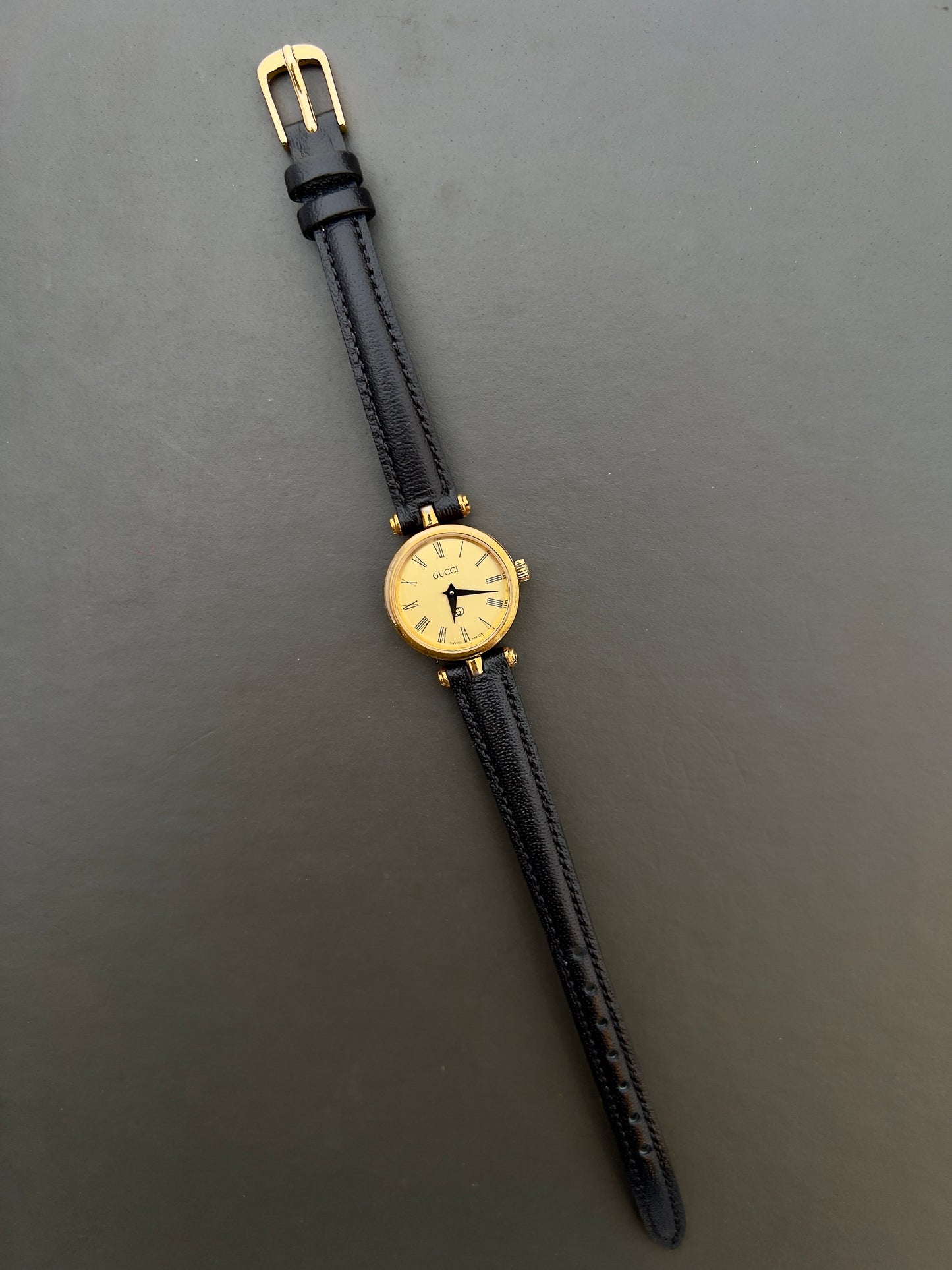Gucci Sherry Ladies Gold Roman Dial Watch in Gold with Black Strap
