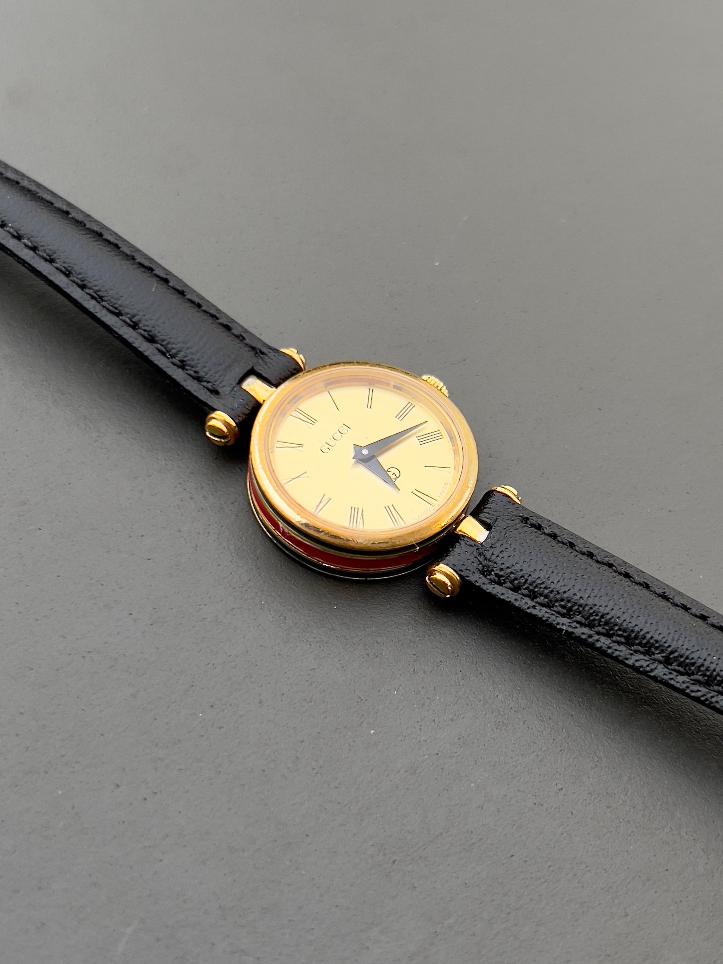 Gucci Sherry Ladies Gold Roman Dial Watch in Gold with Black Strap