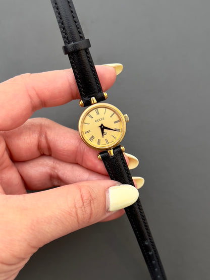 Gucci Sherry Ladies Gold Roman Dial Watch in Gold with Black Strap