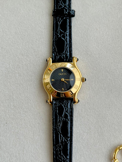 Gucci Gold Toned Ladies Watch with Roman Bezel and Textured Dial