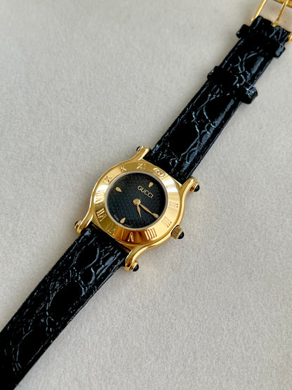 Gucci Gold Toned Ladies Watch with Roman Bezel and Textured Dial