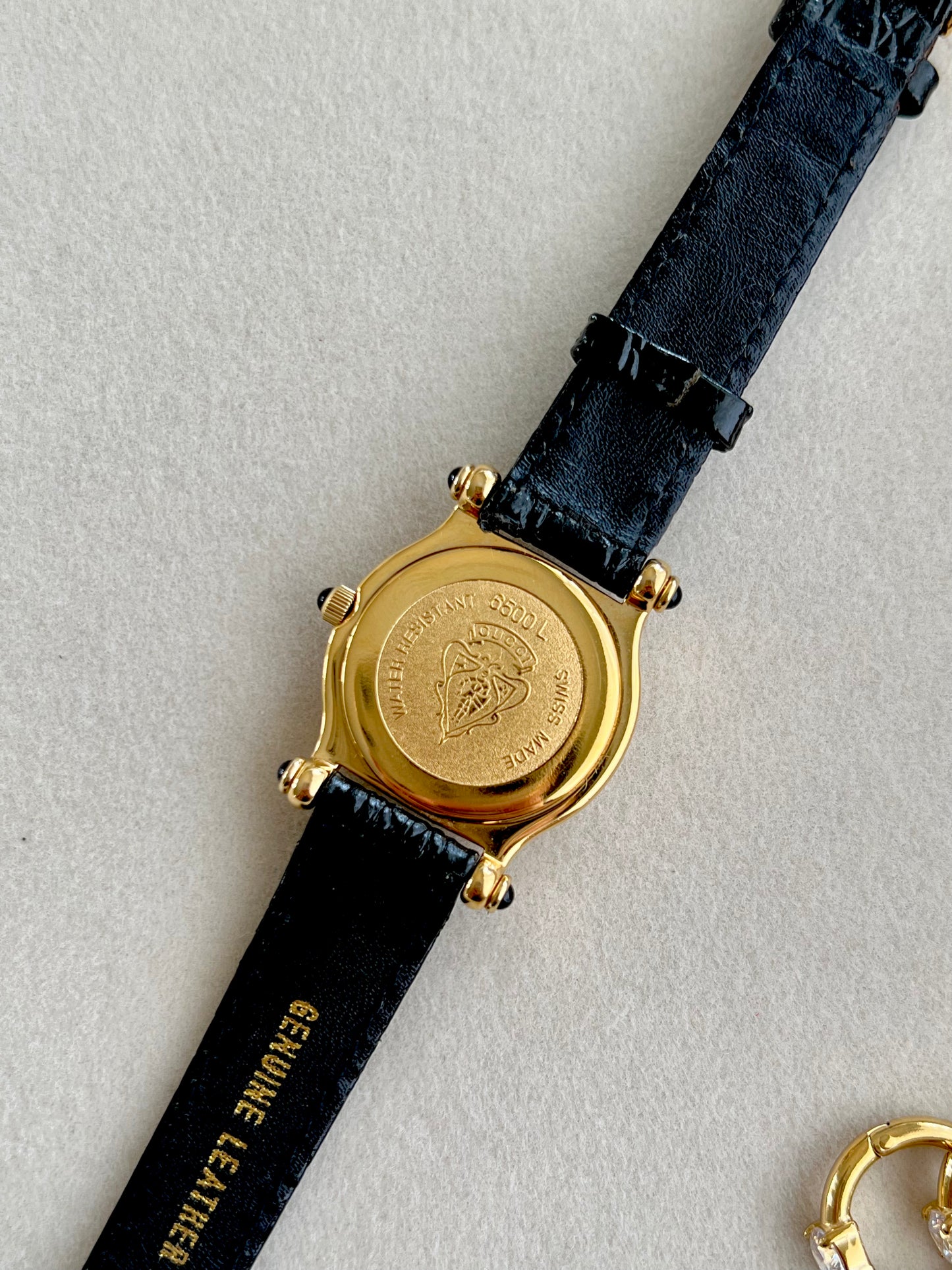 Gucci Gold Toned Ladies Watch with Roman Bezel and Textured Dial