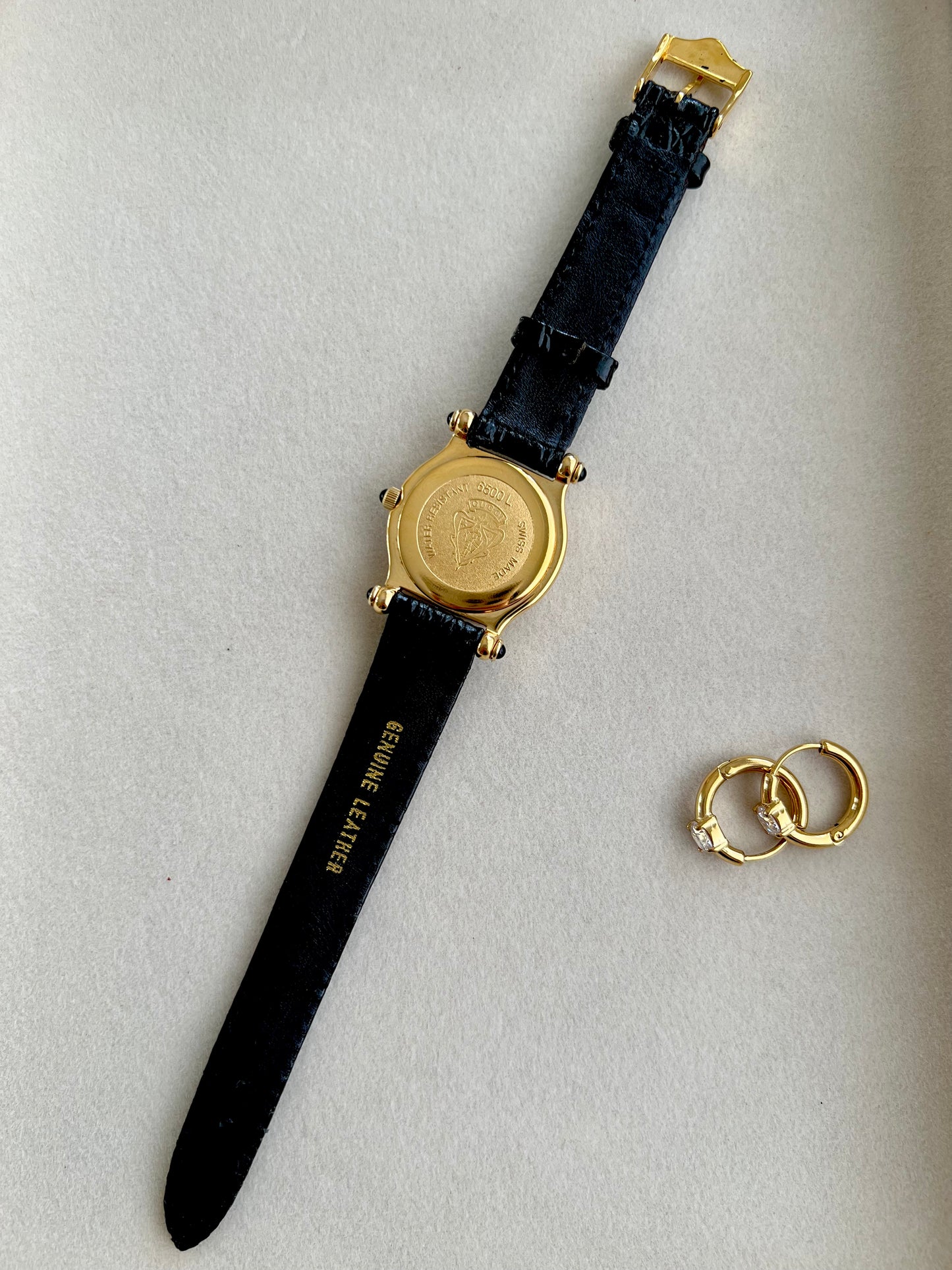 Gucci Gold Toned Ladies Watch with Roman Bezel and Textured Dial