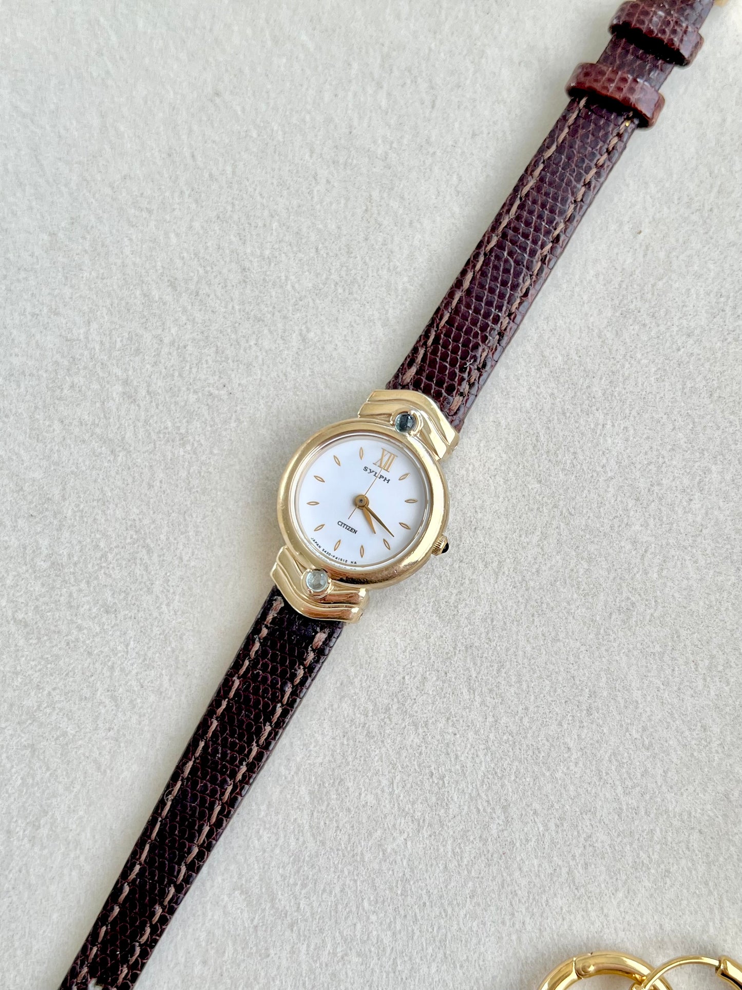 Citizen Gold Toned Women's Watch with Blue Stone