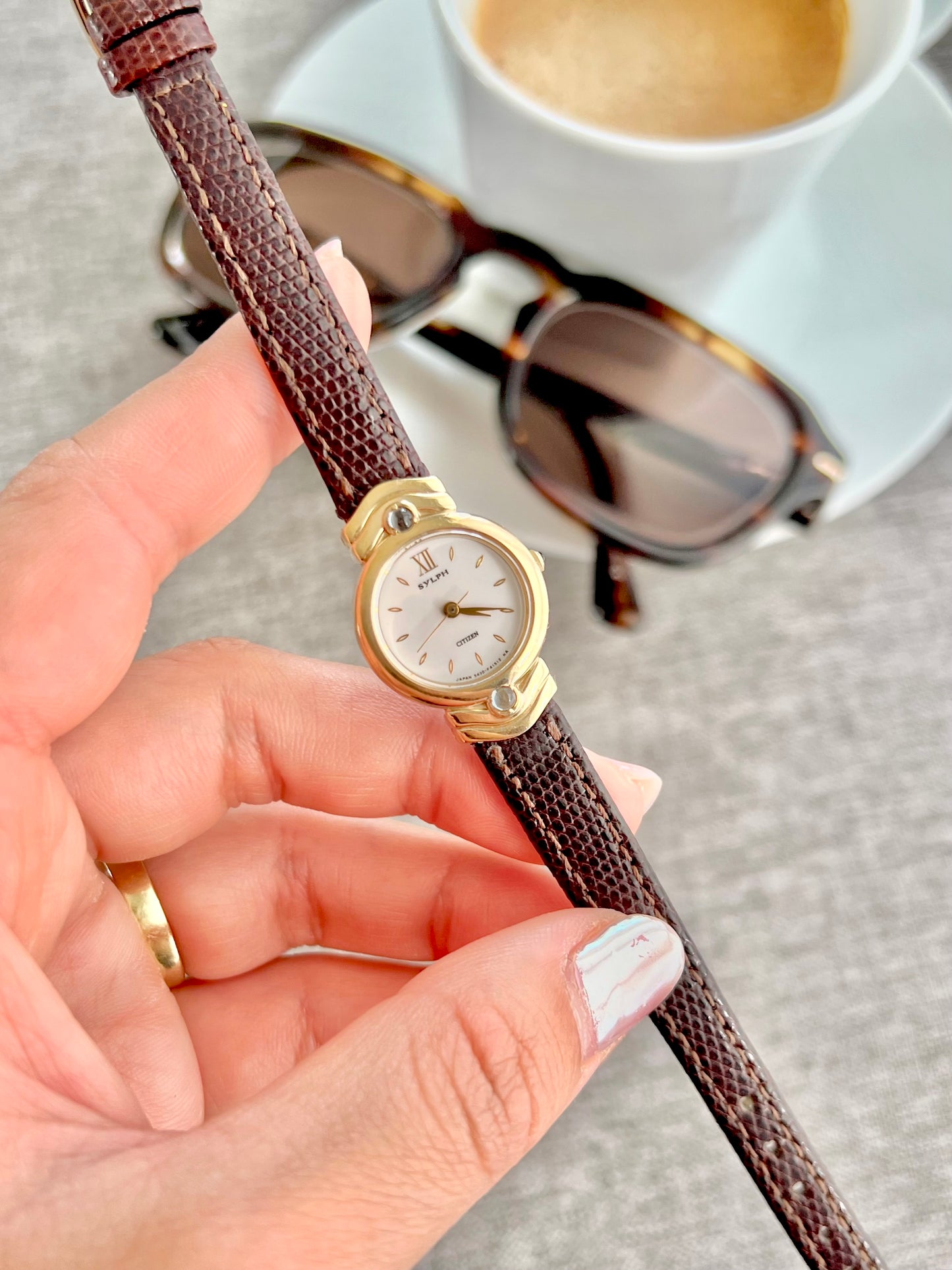 Citizen Gold Toned Women's Watch with Blue Stone