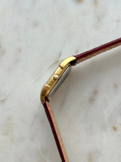 Omega De Ville Gold Women’s Watch with Burgundy Roman Numerals