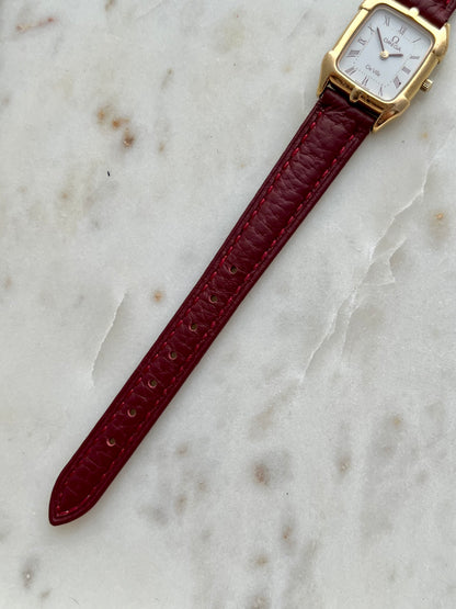 Omega De Ville Gold Women’s Watch with Burgundy Roman Numerals