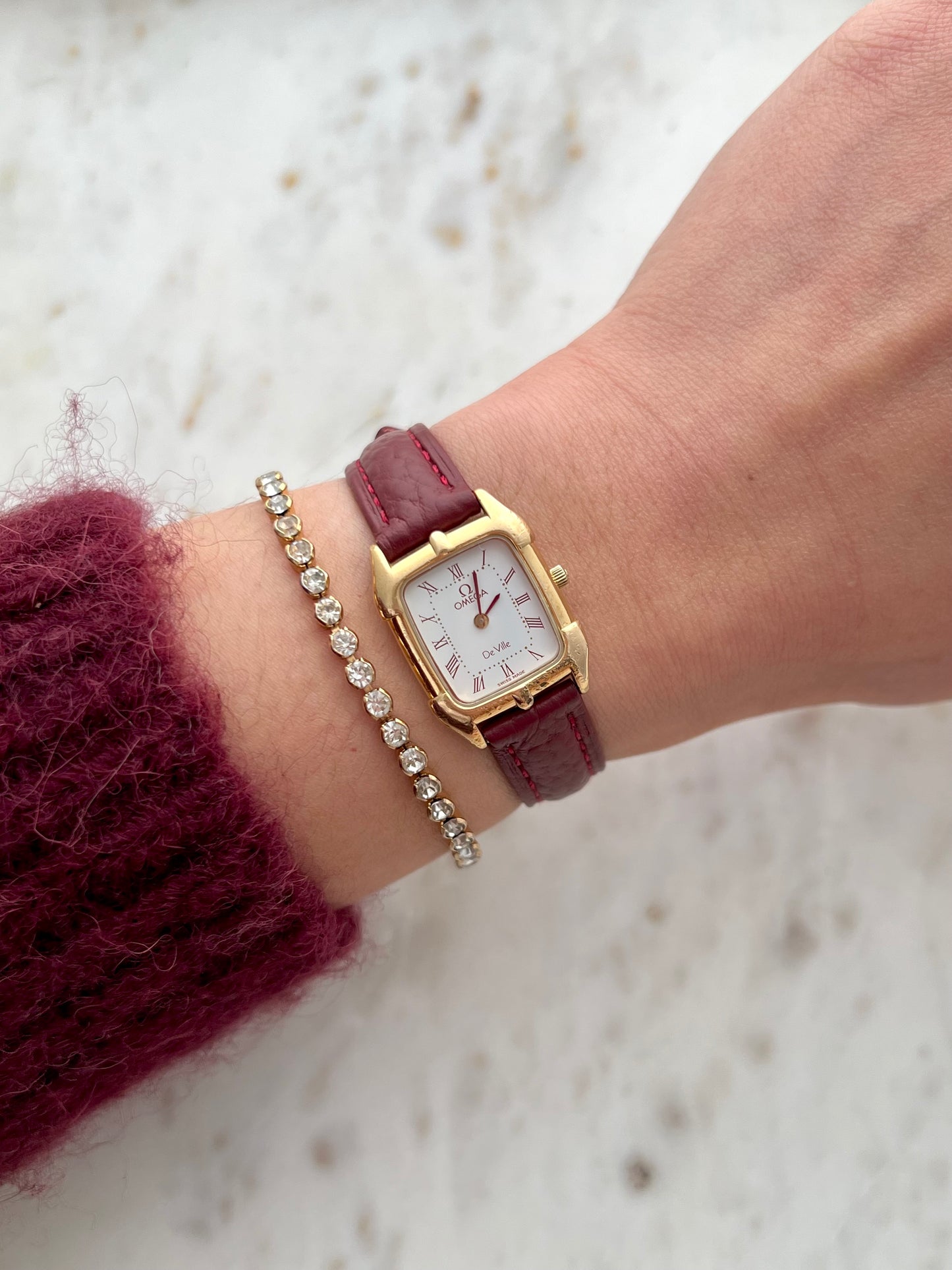 Omega De Ville Gold Women’s Watch with Burgundy Roman Numerals