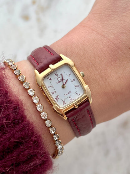 Omega De Ville Gold Women’s Watch with Burgundy Roman Numerals