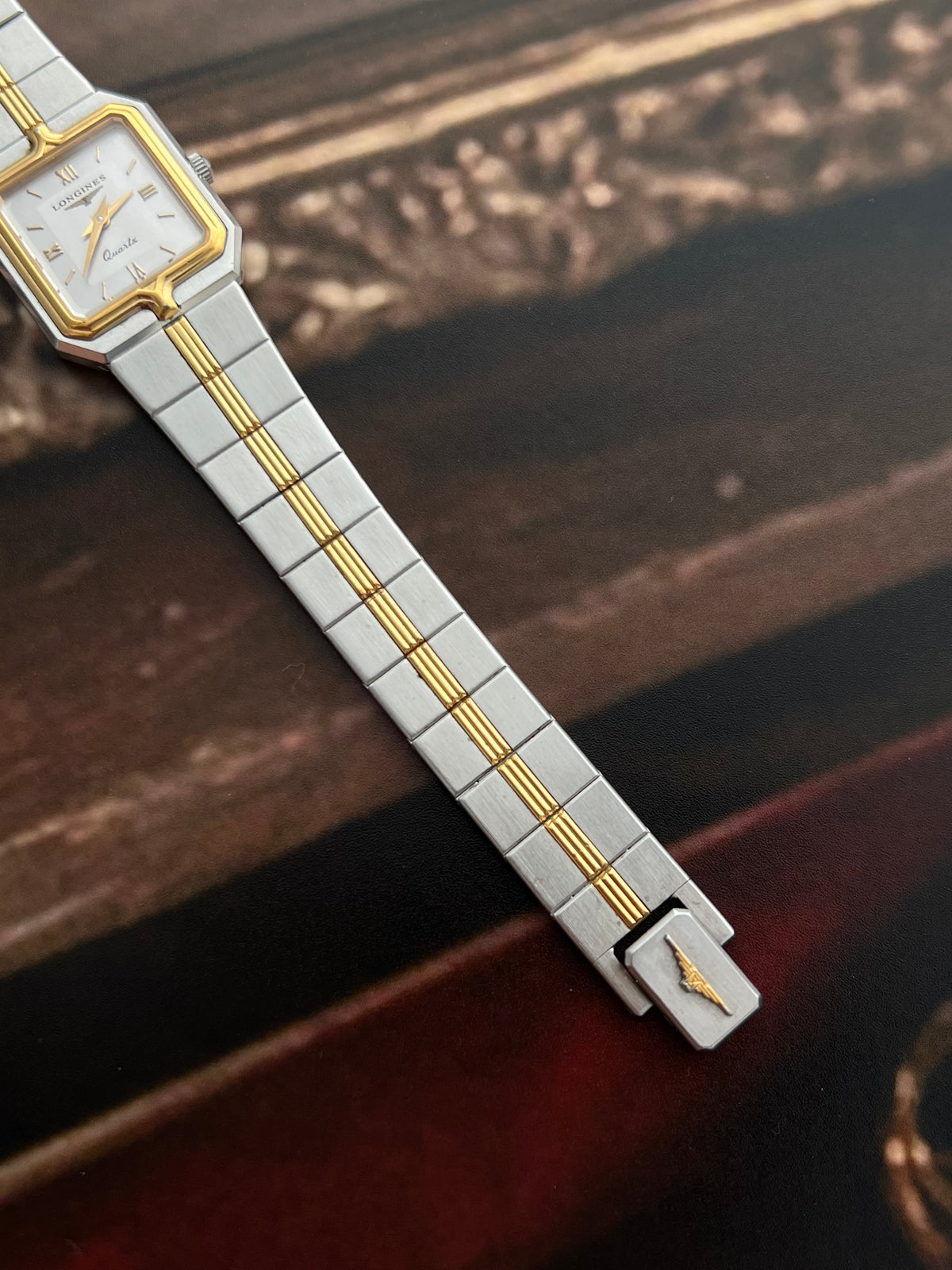 Longines Flagship Two Tone Rectangular Watch, caseback detail of a vintage women's watch at Gilded Hour.