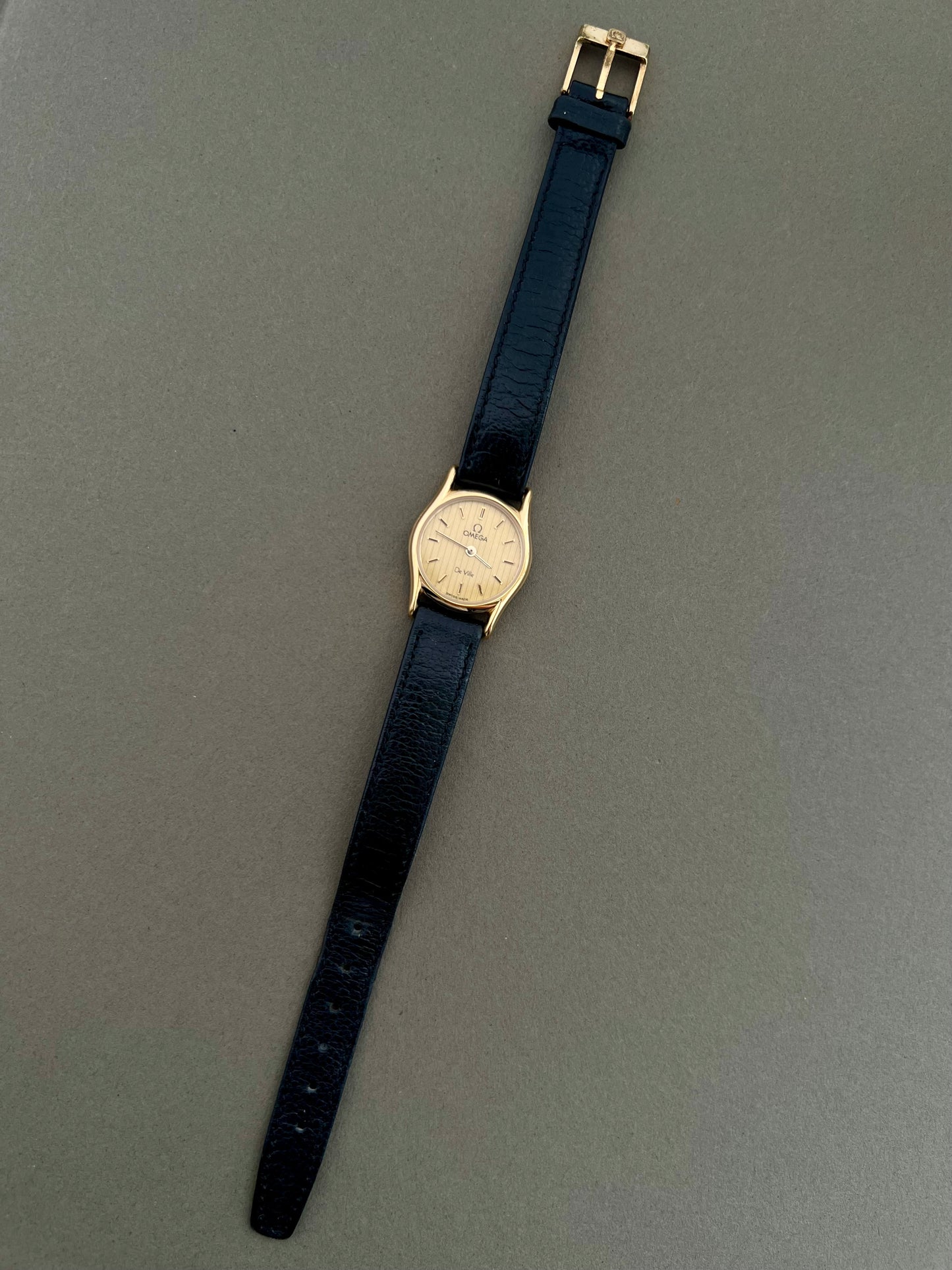 Omega De Ville Ladies Gold Watch with Champagne Textured Dial