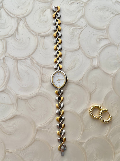 Seiko Lucent Woman's Watch with a Pink Pearlescent Dial
