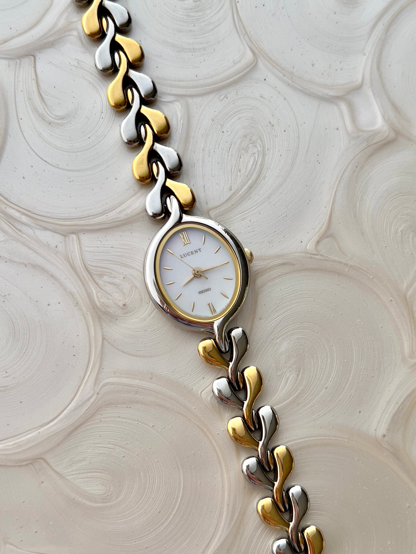 Seiko Lucent Woman's Watch with a Pink Pearlescent Dial