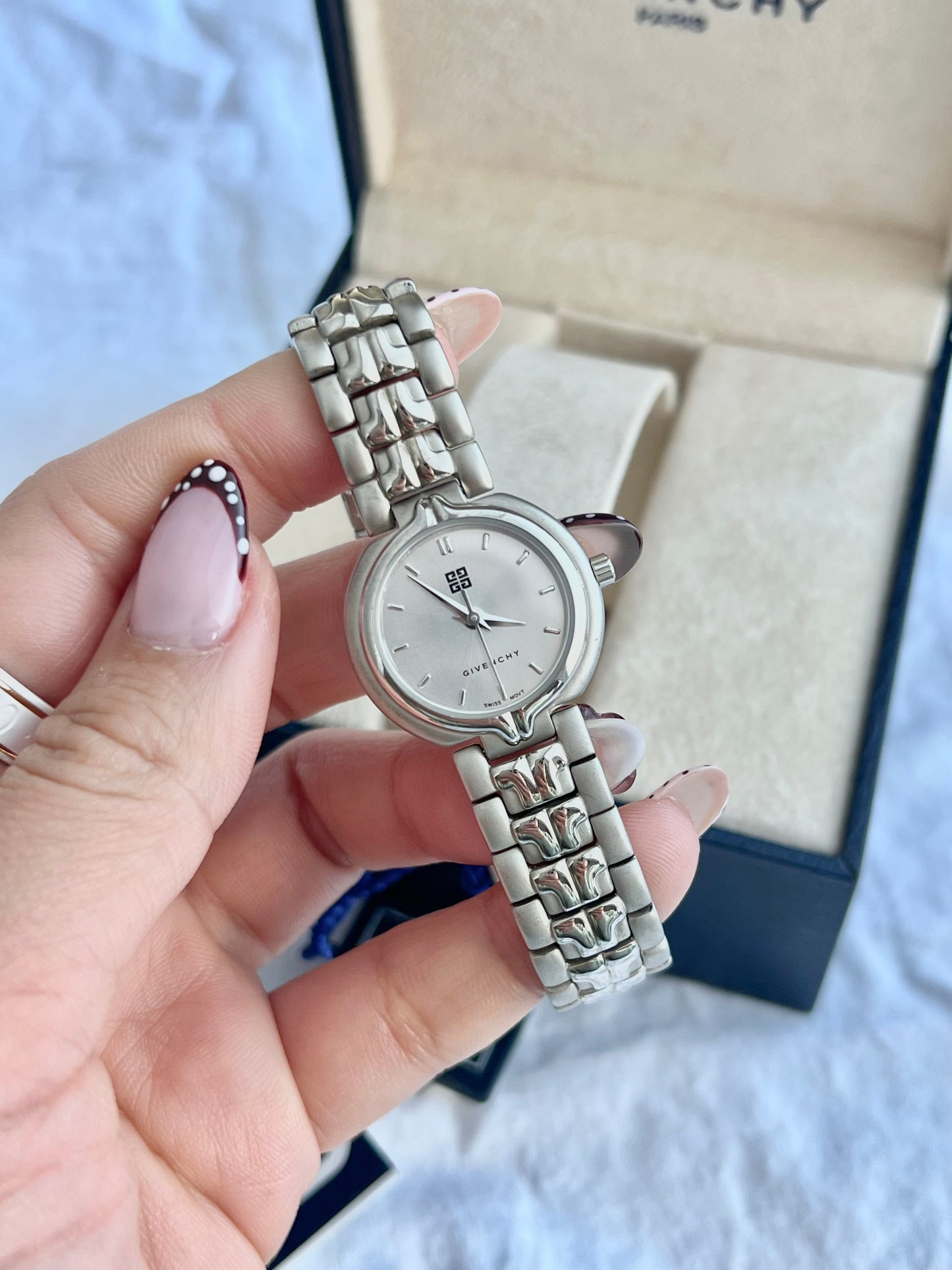 Givenchy Sculpted Round Women’s Watch with Silver Dial