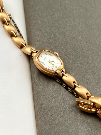 Seiko Tisse Ladies Gold Bracelet Watch with Domed Crystal and Matte Finish