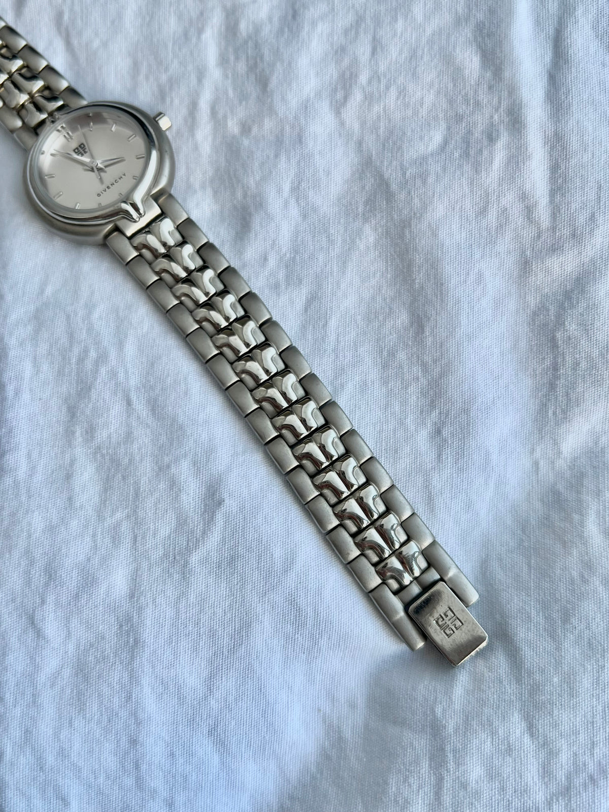 Givenchy Sculpted Round Women’s Watch with Silver Dial