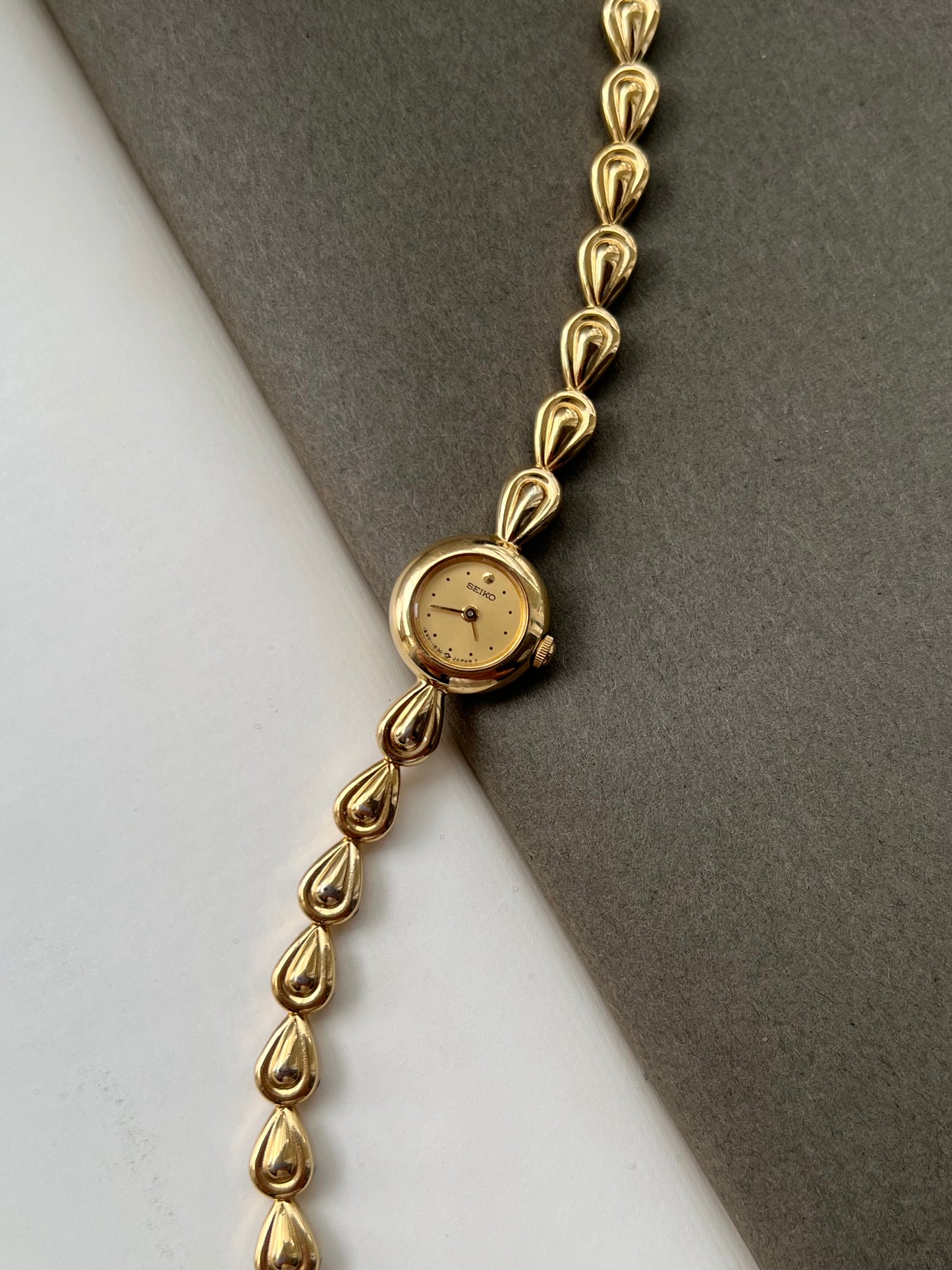 Seiko Ladies Gold Teardrop Bracelet Watch with Champagne Dial
