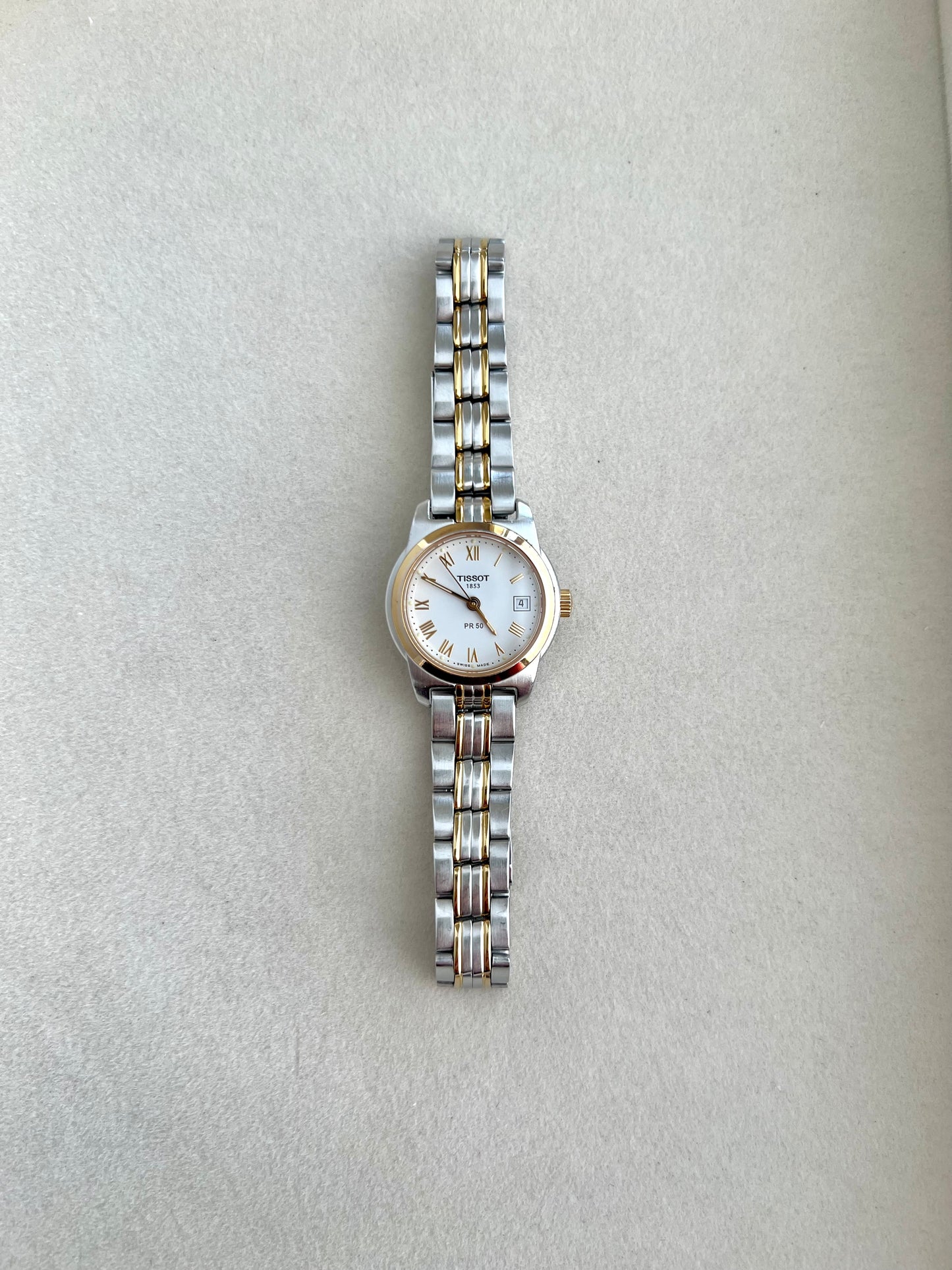 Tissot Two Tone Women's Watch with Golden Roman Numerals
