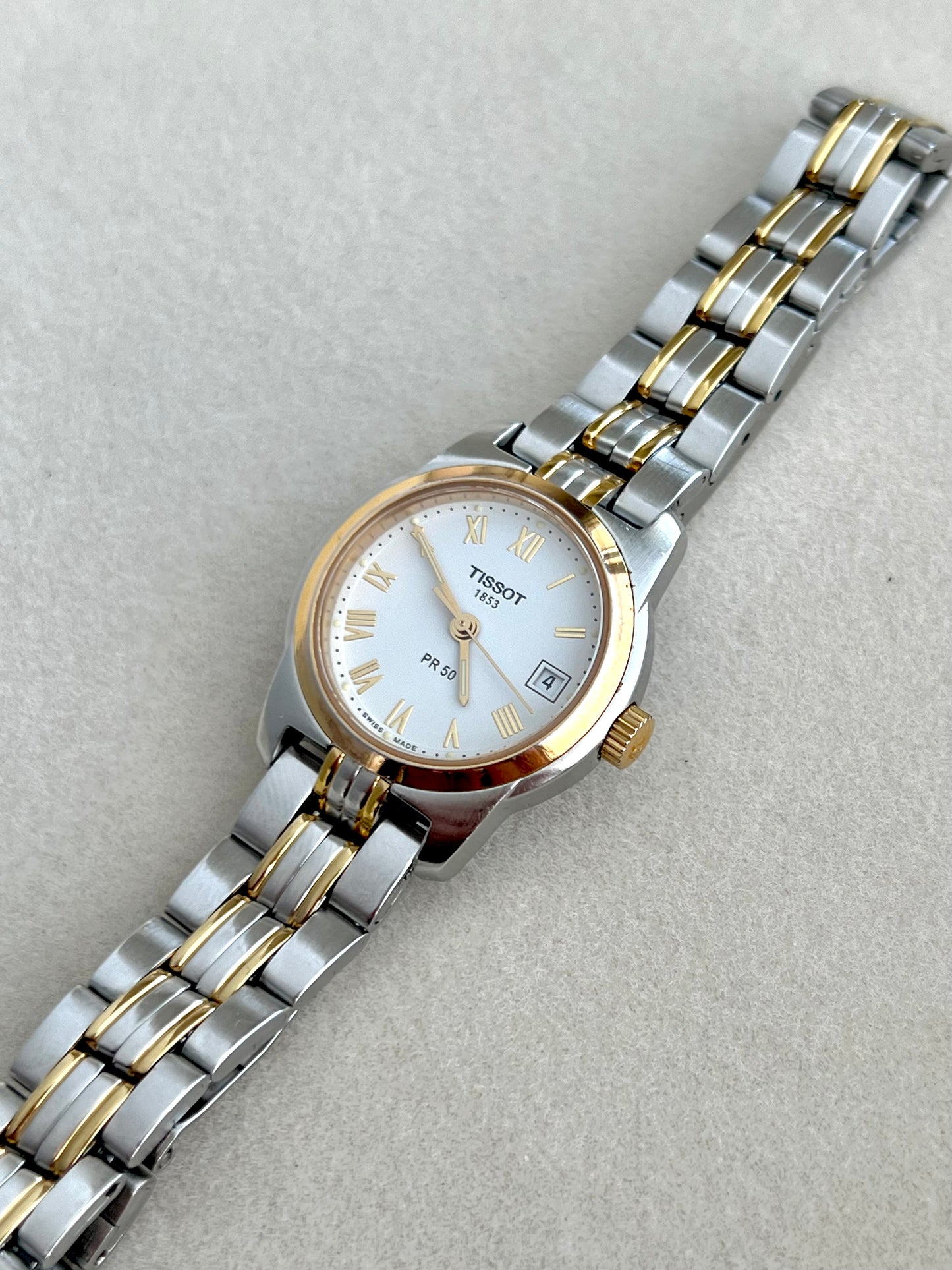 Tissot Two Tone Women's Watch with Golden Roman Numerals
