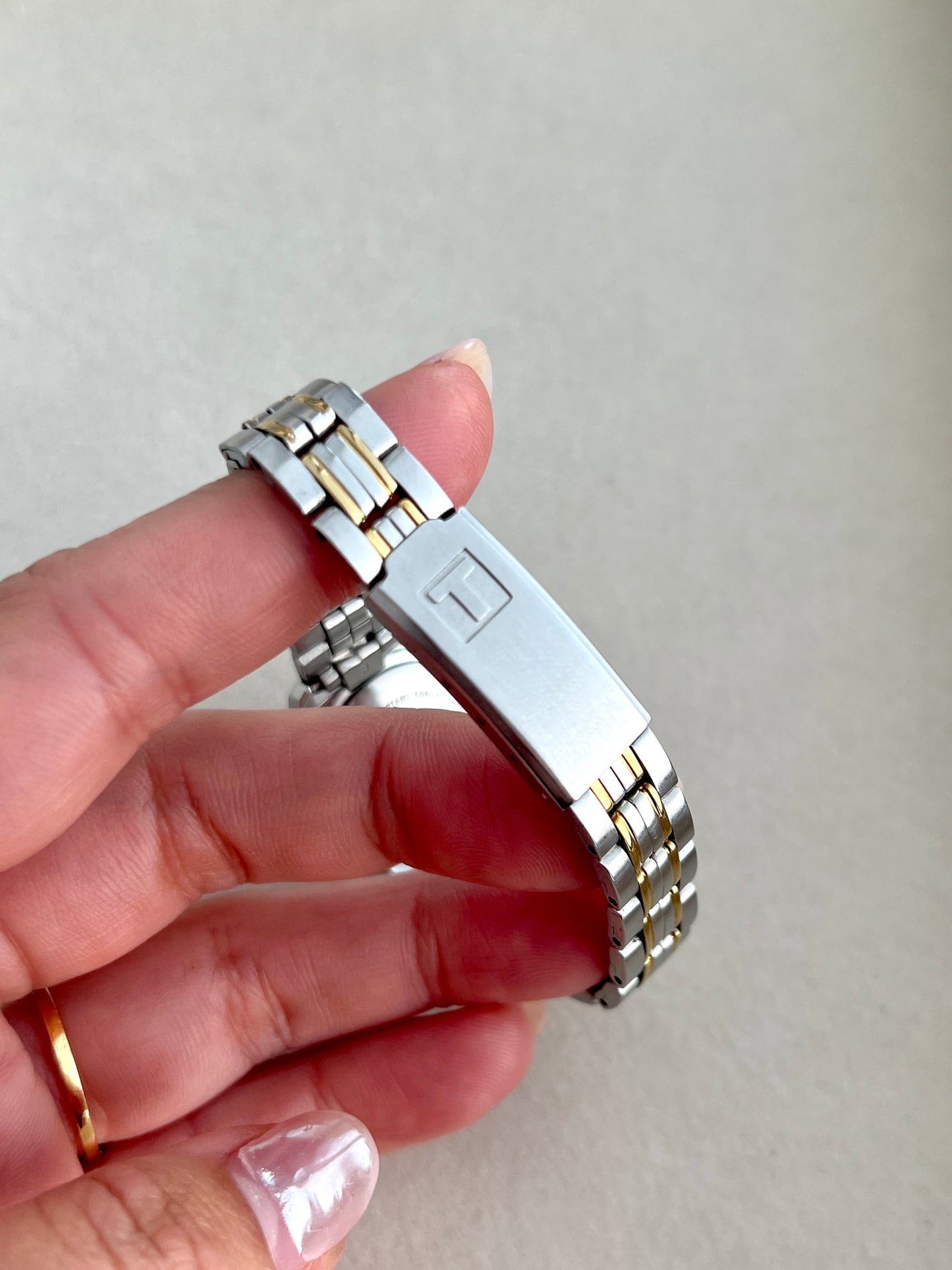 Tissot Two Tone Women's Watch with Golden Roman Numerals