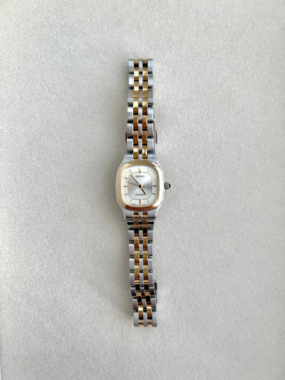 Seiko Exceline Two Tone Soft Rectangular Womens Watch with Silver Sunburst Dial