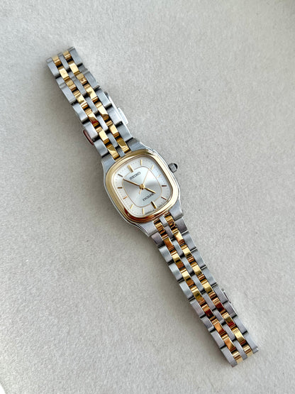 Seiko Exceline Two Tone Soft Rectangular Womens Watch with Silver Sunburst Dial