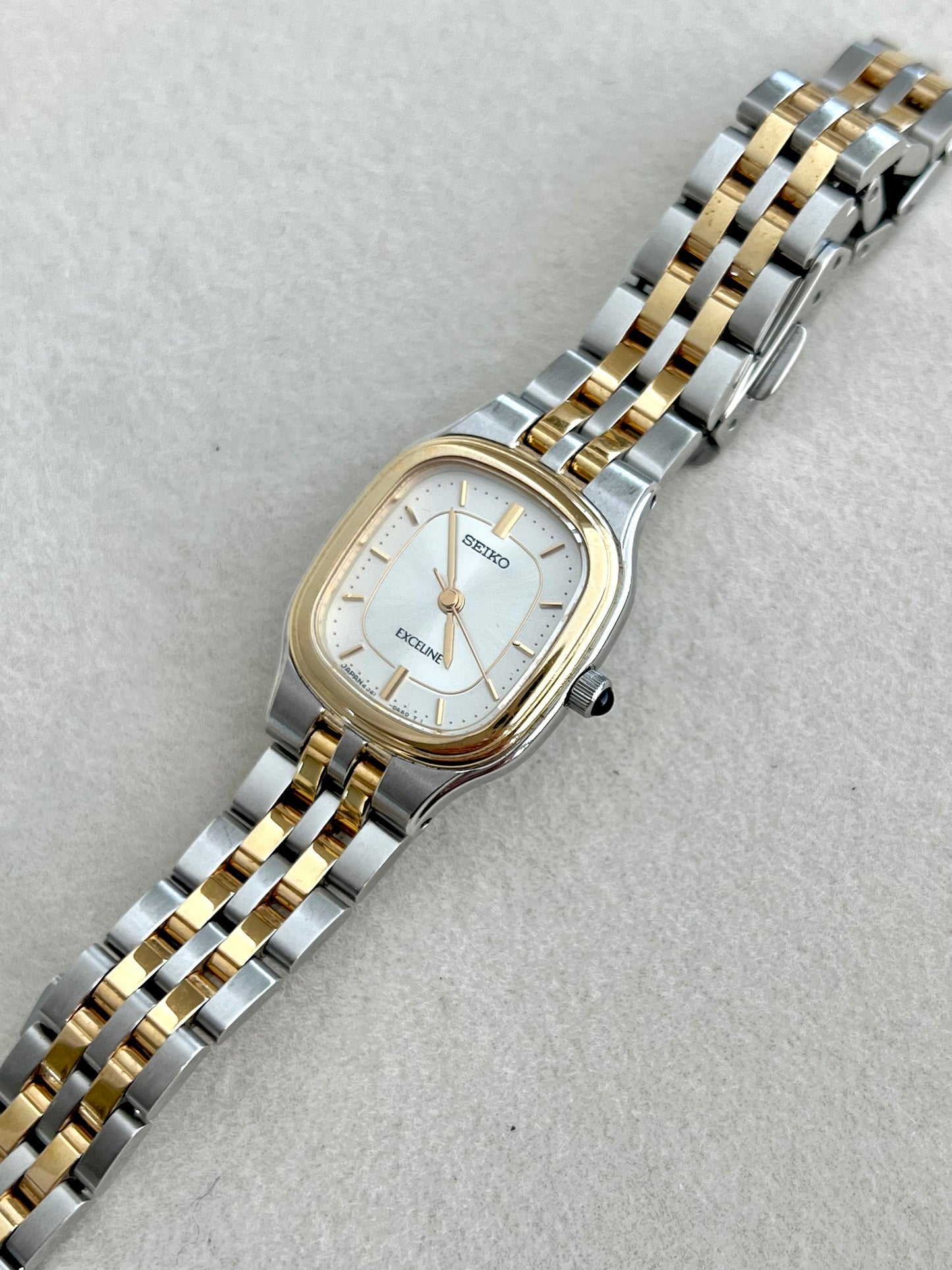 Seiko Exceline Two Tone Soft Rectangular Womens Watch with Silver Sunburst Dial