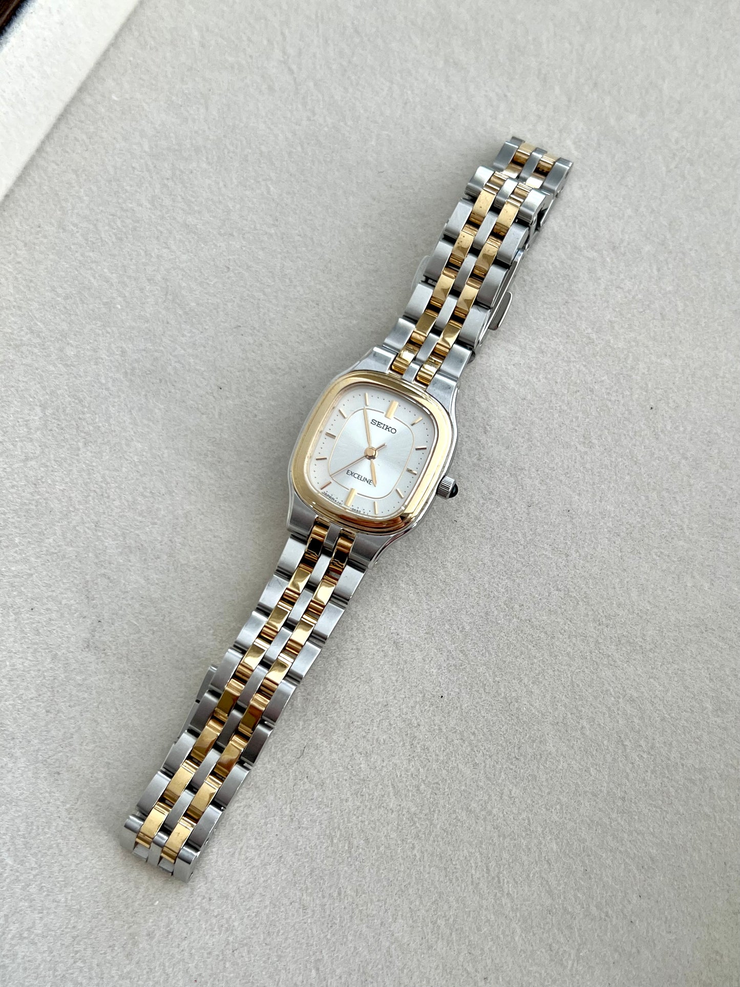 Seiko Exceline Two Tone Soft Rectangular Womens Watch with Silver Sunburst Dial