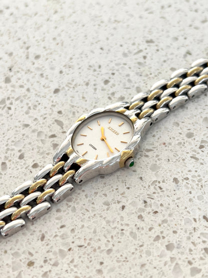 Citizen Womans Watch with a Volcanic Patterned Case & Green Crown Stone