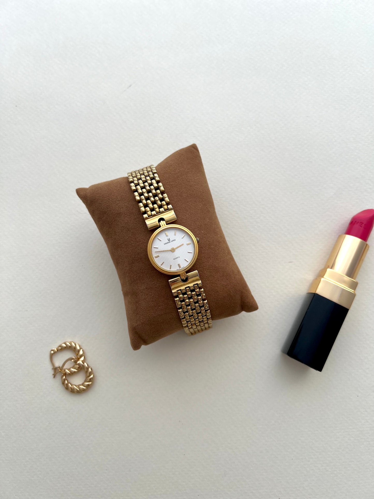 Universal Geneve Gold Bracelet Women’s Watch with Textured Dial