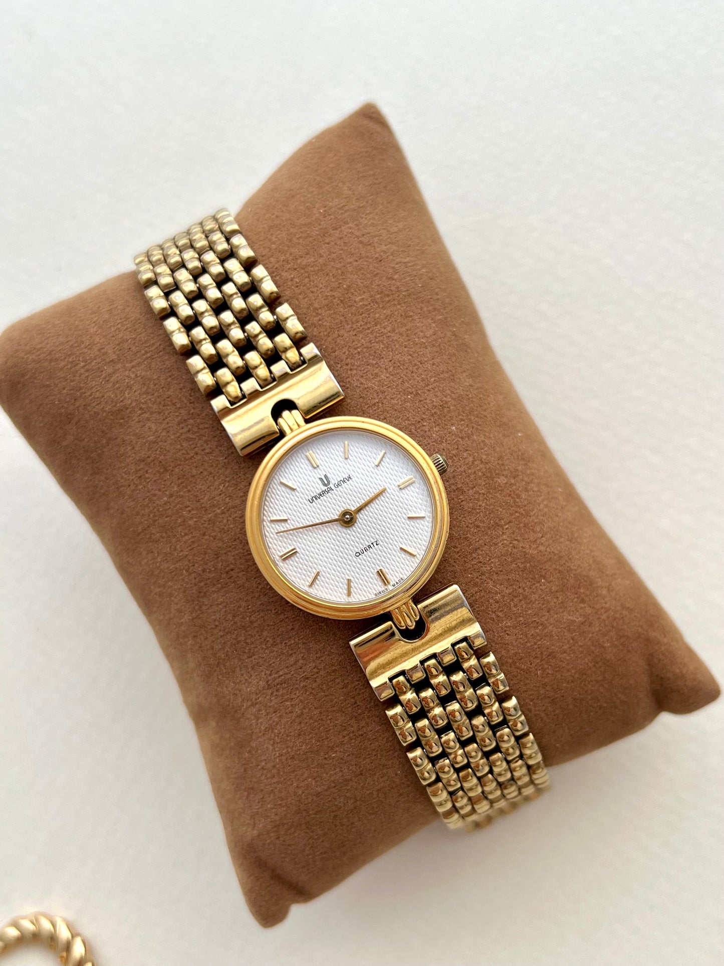 Universal Geneve Gold Bracelet Women’s Watch with Textured Dial