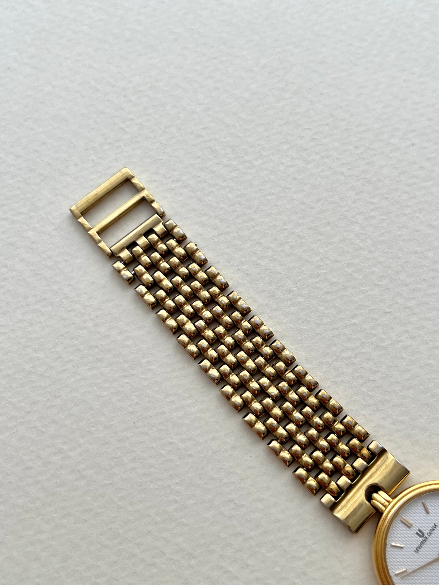 Universal Geneve Gold Bracelet Women’s Watch with Textured Dial