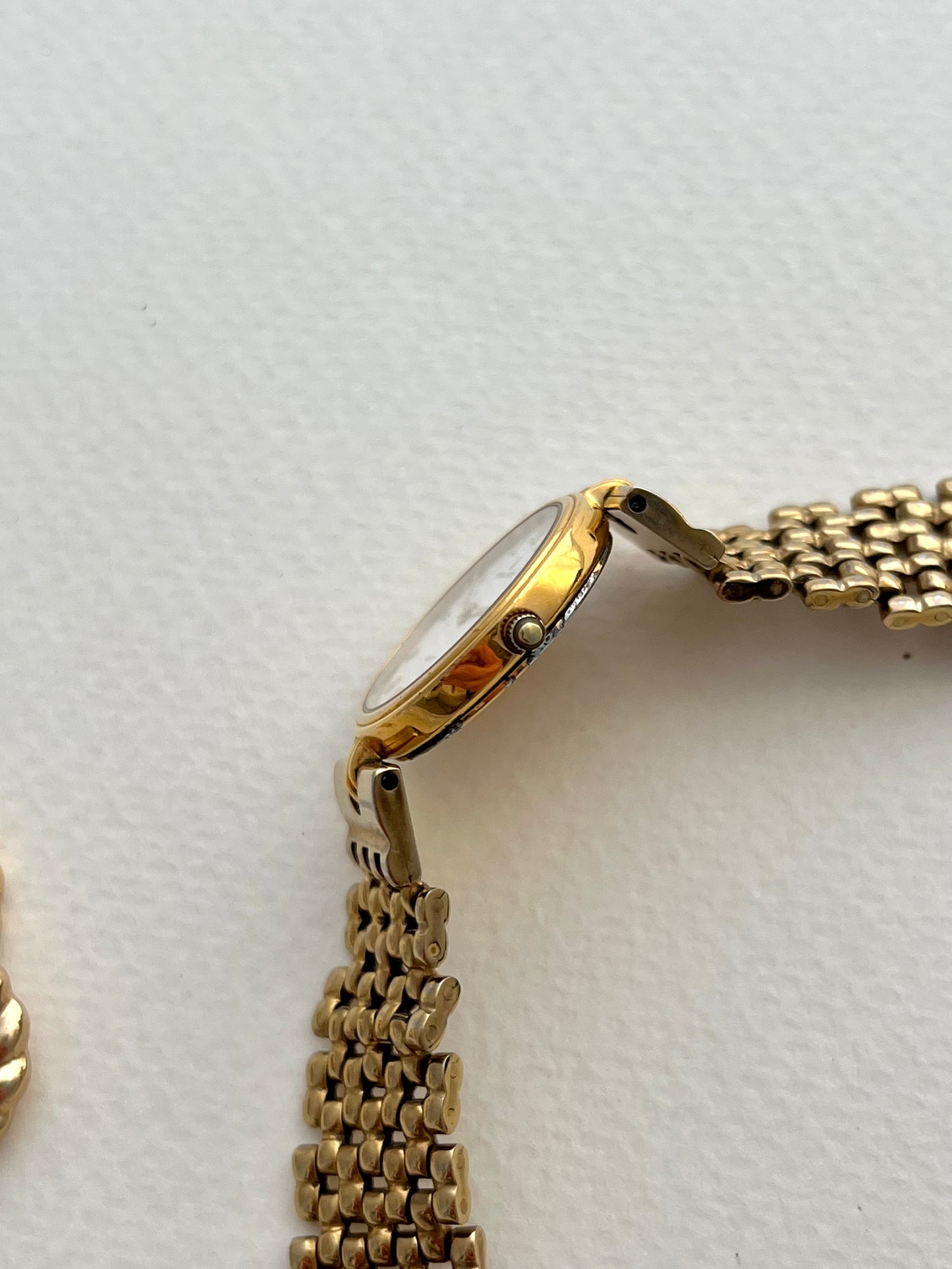 Universal Geneve Gold Bracelet Women’s Watch with Textured Dial