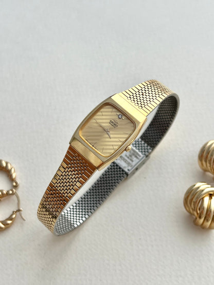 Seiko Striped Gold Dial Women’s Watch