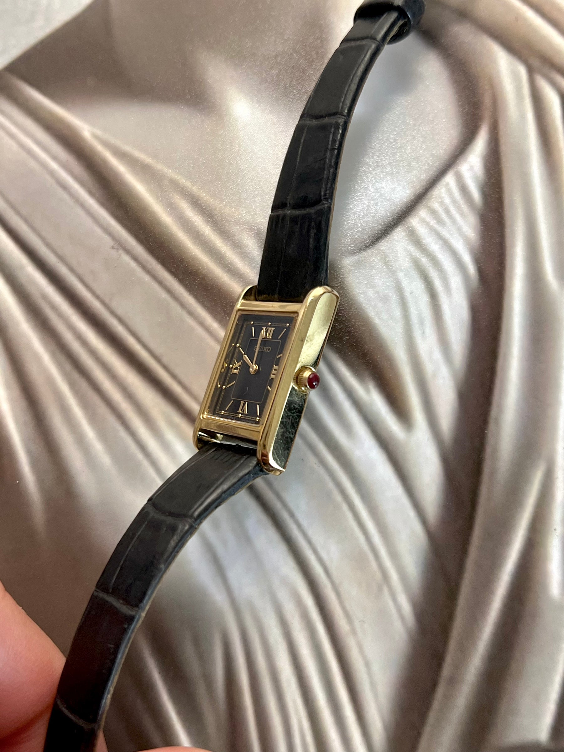 Seiko x Nano Universe watch with red stone crown and black leather strap