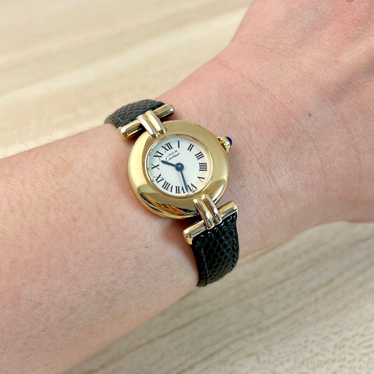 Hirsch Rainbow Watch Strap in Black, front view of a vintage women's watch at Gilded Hour.