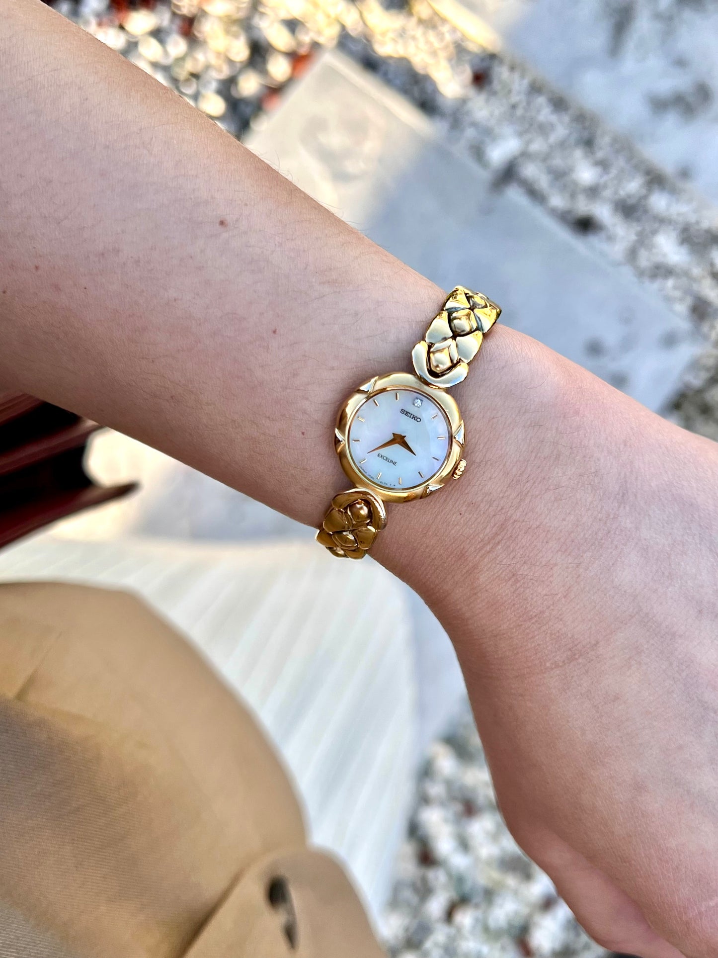 Seiko Exceline Gold Toned Woman's Watch with Radiant Mother of Pearl Dial